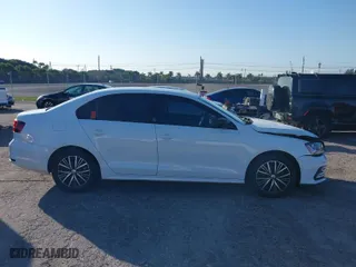 2018 Volkswagen Jetta 1.4T SE with VIN 3VWDB7AJXJM225016, listed as a IAAI auction lot 41309884 with 57,773 mi miles. Bid and sale history available at carsss.com. Image 12.