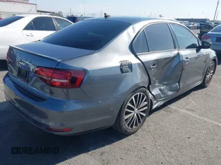 2016 Volkswagen Jetta Sport z VIN 3VWD17AJ5GM231530, wystawiony jako IAAI lot #41968152 z przebiegiem 85 474 mil mil oraz . Historia ofert i sprzedaży dostępna na DreamBid. Obrazek 4.
