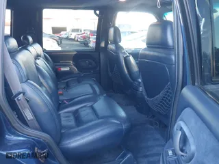 1997 Chevrolet Tahoe with VIN 1GNEK13R4VJ418974, listed as a IAAI auction lot 41560411 with 198,170 mi miles. Bid and sale history available at carsss.com. Image 8.