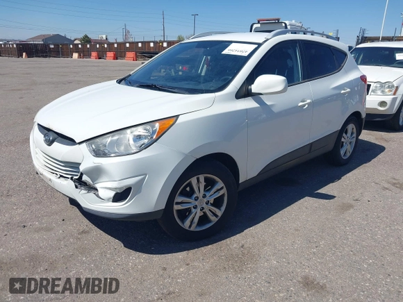 2011 Hyundai Tucson Limited with VIN KM8JUCAC0BU206509, listed as a IAAI auction lot 42034266 with 185,989 mi miles and . Bid and sale history available at DreamBid. Image 2.