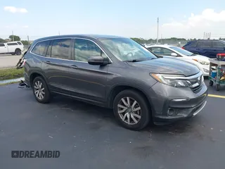 2019 Honda Pilot EX-L z VIN 5FNYF5H54KB013384, wystawiony jako IAAI lot #42345593 z przebiegiem 89 068 mil mil oraz . Historia ofert i sprzedaży dostępna na DreamBid. Obrazek 1.