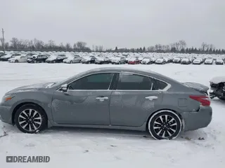 2018 Nissan Altima 2.5 SV with VIN 1N4AL3AP0JC136949, listed as a IAAI auction lot 41572923 with 69,000 mi miles. Bid and sale history available at carsss.com. Image 14.