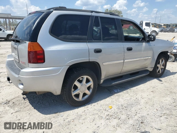 2007 GMC Envoy SLT with VIN 1GKDS13SX72163482, listed as a Copart auction lot 72439864 with 218,719 mi miles and Salvage Title. Bid and sale history available at carsss.com. Image 3.