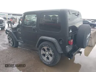 2004 Jeep Wrangler X with VIN 1J4FA39S34P753865, listed as a IAAI auction lot 41948545 with 198,169 mi miles. Bid and sale history available at carsss.com. Image 3.