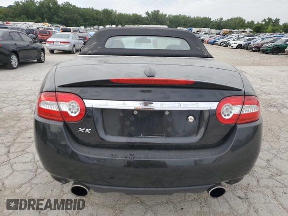 2010 Jaguar XK with VIN SAJWA4GBXALB36341, listed as a Copart auction lot 68307584 with 76,951 mi miles and Salvage Title. Bid and sale history available at carsss.com. Image 6.