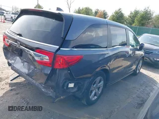 2018 Honda Odyssey EX-L with VIN 5FNRL6H77JB101803, listed as a IAAI auction lot 41927622 with 147,587 mi miles. Bid and sale history available at carsss.com. Image 4.