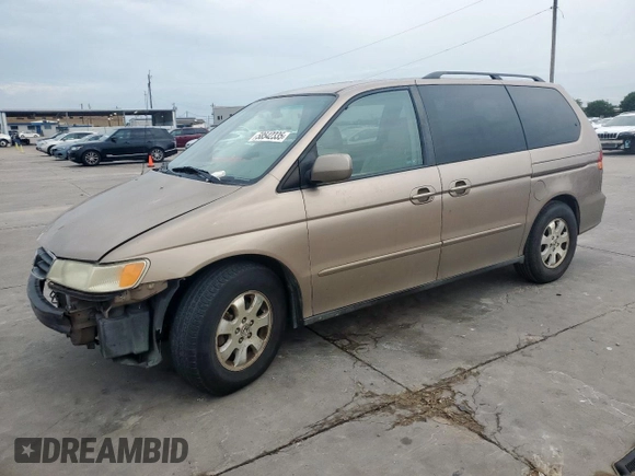 2004 Honda Odyssey EX-L with VIN 5FNRL18944B107051, listed as a Copart auction lot 58542335 with 207,951 mi miles and Salvage title. Bid and sale history available at DreamBid. Image 1.