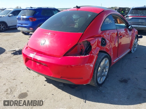 2013 Volkswagen Beetle 2.5L w/Sun/Sound/Nav with VIN 3VWJX7AT0DM673162, listed as a IAAI auction lot 41336320 with Not Provided miles and . Bid and sale history available at DreamBid. Image 4.