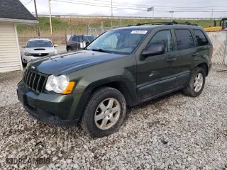 2009 Jeep Grand Cherokee Laredo with VIN 1J8GR48K59C504128, listed as a Copart auction lot 52807835 with 182,053 mi miles and Clean Title. Bid and sale history available at carsss.com. Image 1.
