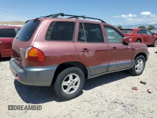 2004 Hyundai Santa Fe with VIN KM8SB12B74U770505, listed as a Copart auction lot 62756304 with 0 mi miles and Salvage Title. Bid and sale history available at carsss.com. Image 3.
