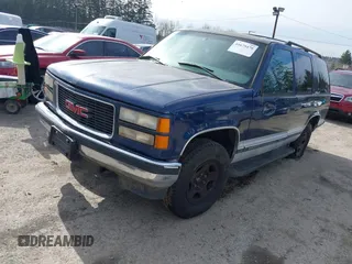 1997 GMC Yukon with VIN 1GKEK13R8VJ737324, listed as a IAAI auction lot 41675479 with 237,223 mi miles. Bid and sale history available at carsss.com. Image 2.