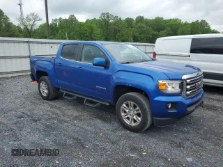 2019 GMC Canyon 4WD SLE z VIN 1GTG6CEN1K1206640, wystawiony jako Copart lot #55339285 z przebiegiem 52 166 mil mil oraz Szkody całkowita. Historia ofert i sprzedaży dostępna na DreamBid. Obrazek 4.