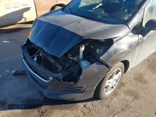 2017 Ford Fiesta SE z VIN 3FADP4BJ6HM125903, wystawiony jako IAAI lot #41376018 z przebiegiem 114 628 mil mil oraz . Historia ofert i sprzedaży dostępna na DreamBid. Obrazek 6.