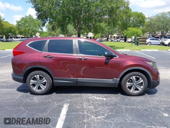 2019 Honda CR-V LX z VIN 2HKRW5H32KH409284, wystawiony jako IAAI lot #42469438 z przebiegiem 143 379 mil mil oraz . Historia ofert i sprzedaży dostępna na DreamBid. Obrazek 13.