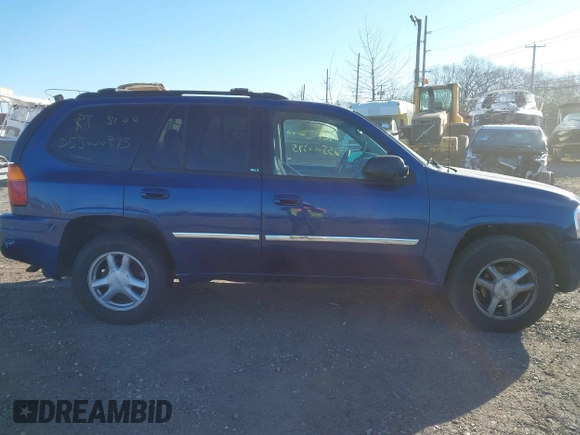 2006 GMC Envoy SLT with VIN 1GKDT13S762170322, listed as a IAAI auction lot 41324540 with 999,999 mi miles. Bid and sale history available at carsss.com. Image 12.