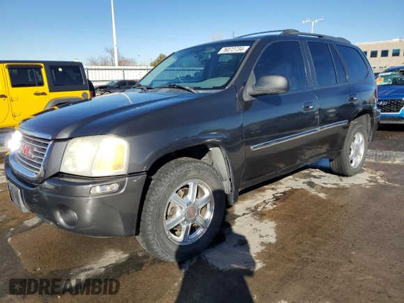 2007 GMC Envoy SLE with VIN 1GKDT13S572183409, listed as a Copart auction lot 76072734 with 165,362 mi miles and Salvage Title. Bid and sale history available at carsss.com. Image 1.