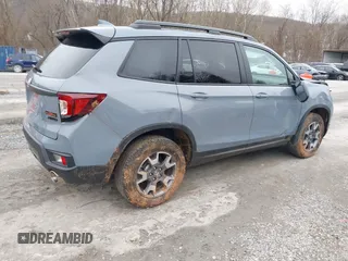 2022 Honda Passport TrailSport with VIN 5FNYF8H61NB018170, listed as a IAAI auction lot 41503190 with 21,469 mi miles and . Bid and sale history available at DreamBid. Image 4.