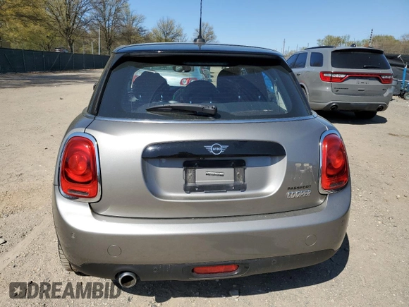 2019 MINI Hardtop 4 Door Cooper with VIN WMWXU1C52K2J02579, listed as a Copart auction lot 53507295 with 94,350 mi miles and Salvage Title. Bid and sale history available at DreamBid. Image 6.