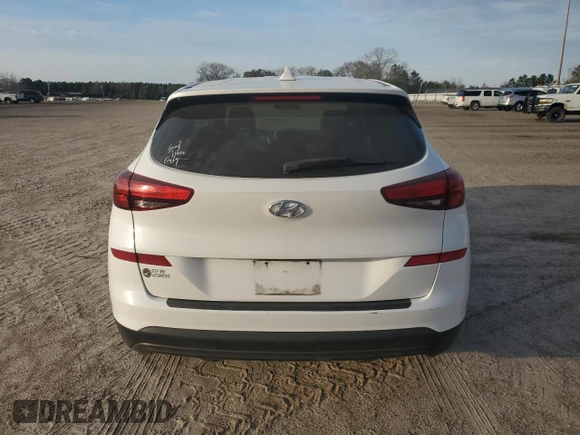 2019 Hyundai Tucson SE with VIN KM8J23A46KU031522, listed as a Copart auction lot 45322715 with 77,491 mi miles and Salvage Title. Bid and sale history available at carsss.com. Image 6.