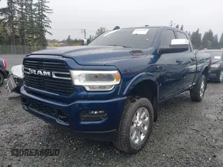 2022 Ram 2500 Laramie with VIN 3C6UR5FLXNG229043, listed as a IAAI auction lot 41859394 with 31,631 mi miles. Bid and sale history available at carsss.com. Image 2.