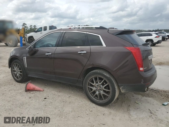 2015 Cadillac SRX Performance Collection with VIN 3GYFNCE38FS571733, listed as a Copart auction lot 54946215 with 147,343 mi miles and Salvage title. Bid and sale history available at DreamBid. Image 2.