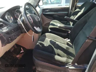 2017 Dodge Grand Caravan SE with VIN 2C4RDGBGXHR615610, listed as a Copart auction lot 51448705 with 217,815 mi miles and Salvage Title. Bid and sale history available at DreamBid. Image 7.