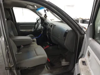 2006 Dodge Dakota SLT with VIN 1D7HW42K36S557656, listed as a IAAI auction lot 41446296 with 97,000 mi miles and . Bid and sale history available at carsss.com. Image 5.