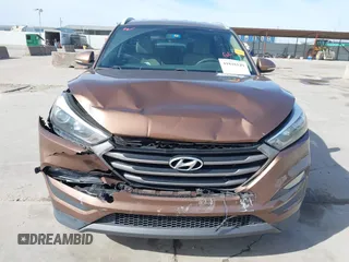 2016 Hyundai Tucson Limited with VIN KM8J33A20GU137662, listed as a IAAI auction lot 41818149 with 120,010 mi miles. Bid and sale history available at carsss.com. Image 12.