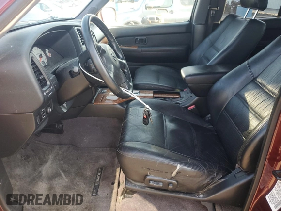2003 Nissan Pathfinder LE with VIN JN8DR09Y83W831073, listed as a Copart auction lot 62382265 with 94,596 mi miles and Salvage title. Bid and sale history available at DreamBid. Image 7.