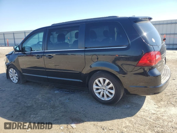 2014 Volkswagen Routan SE with VIN 2C4RVABG9ER135273, listed as a Copart auction lot 45343575 with 94,528 mi miles and Salvage title. Bid and sale history available at DreamBid. Image 2.