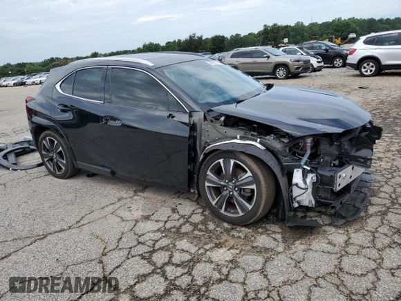 2023 Lexus UX 250h Premium с VIN JTHP6JBH8P2133821, выставлен на аукционе Copart как лот 61007355 с пробегом 32 540 миль миль и Списание • Salvage title. История ставок и продаж доступна на DreamBid. Изображение 4.