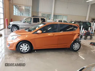2015 Hyundai Accent GS with VIN KMHCT5AE6FU211955, listed as a IAAI auction lot 41610857 with 106,497 mi miles. Bid and sale history available at carsss.com. Image 14.