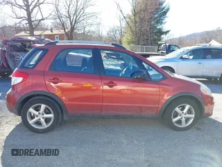 2009 Suzuki SX4 Touring AWD with VIN JS2YB417595100925, listed as a IAAI auction lot 41693882 with 76,972 mi miles and . Bid and sale history available at DreamBid. Image 14.
