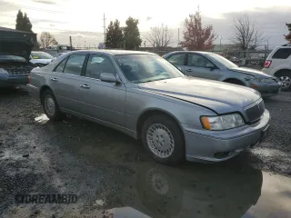 1999 Infiniti Q45 z VIN JNKBY31A3XM602869, wystawiony jako Copart lot #78799354 z przebiegiem 189 083 mil mil oraz Szkoda całkowita • Salvage title. Historia ofert i sprzedaży dostępna na DreamBid. Obrazek 4.