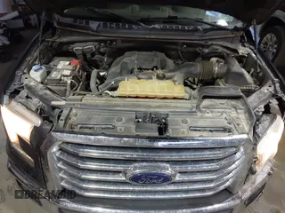2015 Ford F-150 XLT with VIN 1FTEX1EP3FKE57475, listed as a IAAI auction lot 41435394 with 233,560 mi miles. Bid and sale history available at carsss.com. Image 10.