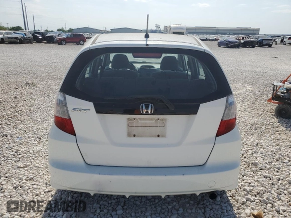 2012 Honda Fit с VIN JHMGE8H33CC030639, выставлен на аукционе Copart как лот 53114595 с пробегом 108 797 миль миль и Списание • Salvage title. История ставок и продаж доступна на DreamBid. Изображение 6.