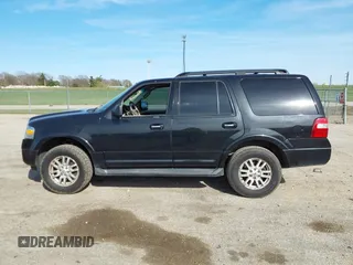 2012 Ford Expedition XLT with VIN 1FMJU1J51CEF40095, listed as a IAAI auction lot 41890811 with 202,090 mi miles and . Bid and sale history available at DreamBid. Image 14.