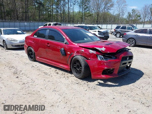 2008 Mitsubishi Lancer Evolution GSR with VIN JA3AW86V38U050561, listed as a IAAI auction lot 41879629 with 104,905 mi miles. Bid and sale history available at carsss.com. Image 1.