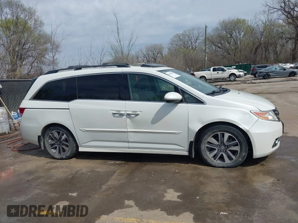 2014 Honda Odyssey Touring с VIN 5FNRL5H94EB057681, выставлен на аукционе IAAI как лот 41828000 с пробегом 249 350 миль миль и . История ставок и продаж доступна на DreamBid. Изображение 14.