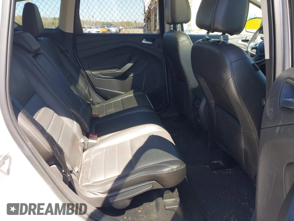 2016 Ford Escape Titanium with VIN 1FMCU9JXXGUA51537, listed as a IAAI auction lot 42118922 with 109,439 mi miles. Bid and sale history available at carsss.com. Image 8.