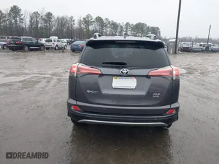 2018 Toyota RAV4 XLE with VIN 2T3RFREV5JW798328, listed as a IAAI auction lot 41868104 with 61,076 mi miles. Bid and sale history available at carsss.com. Image 16.