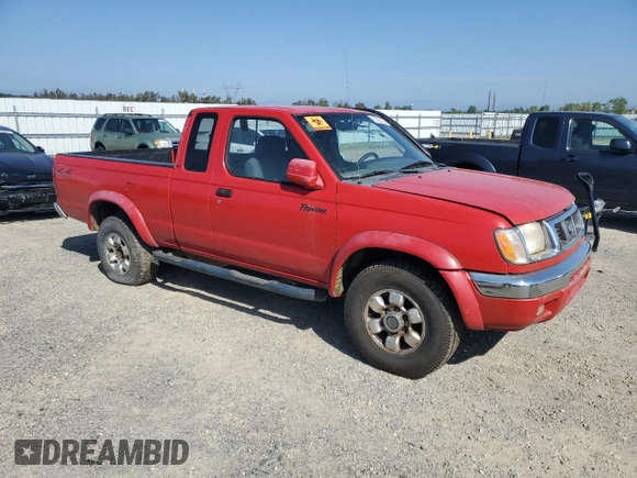 1999 Nissan Frontier XE with VIN 1N6ED26Y1XC302907, listed as a Copart auction lot 51323035 with 218,325 mi miles and Clean title. Bid and sale history available at DreamBid. Image 4.