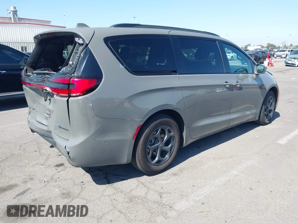 2021 Chrysler Pacifica Hybrid Limited z VIN 2C4RC1S76MR544495, wystawiony jako IAAI lot #42294312 z przebiegiem 89 083 mil mil oraz . Historia ofert i sprzedaży dostępna na DreamBid. Obrazek 4.