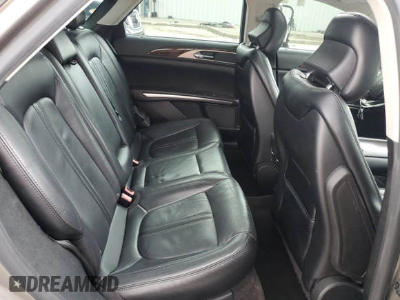 2015 Lincoln MKZ z VIN 3LN6L2G9XFR611837, wystawiony jako Copart lot #55038635 z przebiegiem 133 596 mil mil oraz Szkoda całkowita • Salvage title. Historia ofert i sprzedaży dostępna na DreamBid. Obrazek 10.