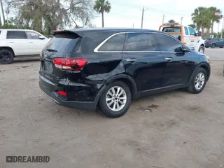 2020 Kia Sorento LX V6 with VIN 5XYPG4A51LG626506, listed as a IAAI auction lot 41554232 with 136,364 mi miles. Bid and sale history available at carsss.com. Image 4.