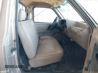 1994 Ford Ranger Splash z VIN 1FTCR10A5RUE28850, wystawiony jako IAAI lot #41882134 z przebiegiem 186 104 mil mil oraz . Historia ofert i sprzedaży dostępna na DreamBid. Obrazek 5.