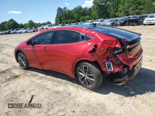 2024 Toyota Prius LE z VIN JTDACAAU1R3016920, wystawiony jako Copart lot #55333035 z przebiegiem 14 490 mil mil oraz Czysty tytuł • Clean title. Historia ofert i sprzedaży dostępna na DreamBid. Obrazek 2.