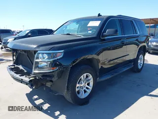 2015 Chevrolet Tahoe LS with VIN 1GNSCAKC5FR645736, listed as a IAAI auction lot 42064623 with 223,149 mi miles and . Bid and sale history available at DreamBid. Image 2.