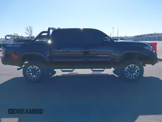 2023 Toyota Tacoma 4WD SR with VIN 3TYCZ5AN0PT110522, listed as a IAAI auction lot 41740128 with 45,115 mi miles. Bid and sale history available at carsss.com. Image 13.