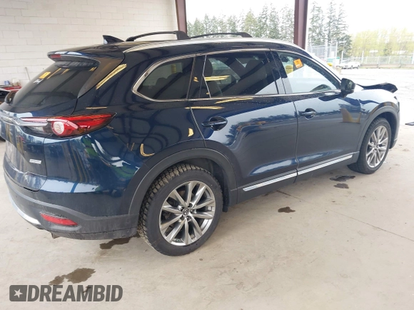 2018 Mazda CX-9 Grand Touring with VIN JM3TCBDY0J0216195, listed as a IAAI auction lot 41976122 with 90,083 mi miles and . Bid and sale history available at DreamBid. Image 4.